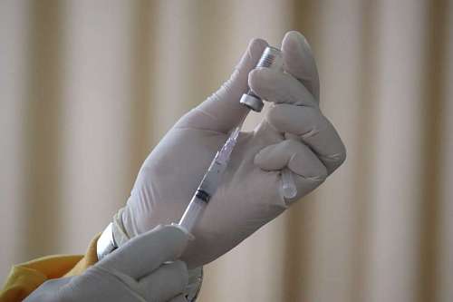 Doctor with syringe