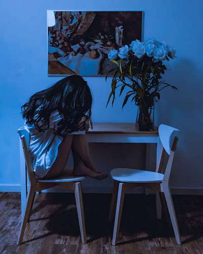 Woman alone at the table