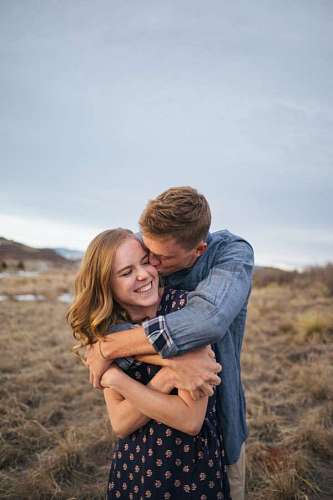 close-up of a couple enjoying the moment in a valley