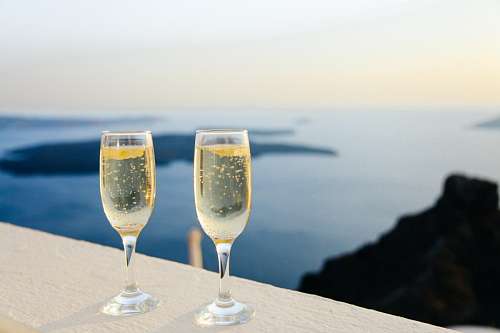 alcoholica Glasses of champagne in front of the sea