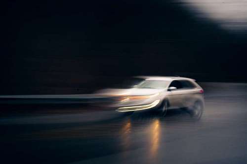  Car with sweeping effect on the road