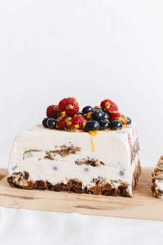 Red berry cake on white background