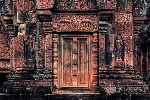 Door carved in stone in the magical temple of Angkor Wat