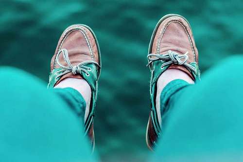 Man with green shoes and pants
