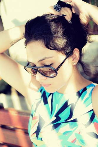 Woman tying her hair