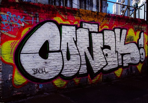 Wall with graffiti by Coñak