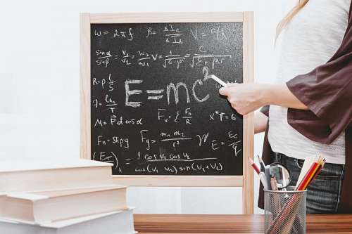 problem-solving Blackboard with mathematical formulas