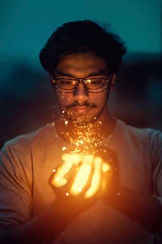 ember beautiful optical illusion of man holding an ember