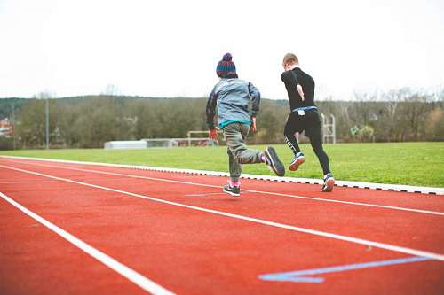 two boys running a race