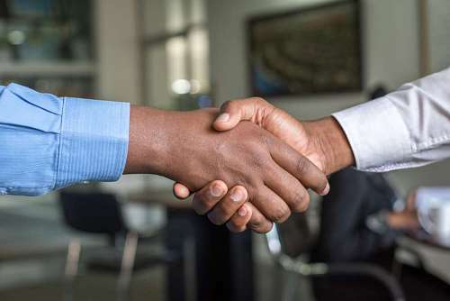 ethnic-heritage Two men shaking hands. Close up