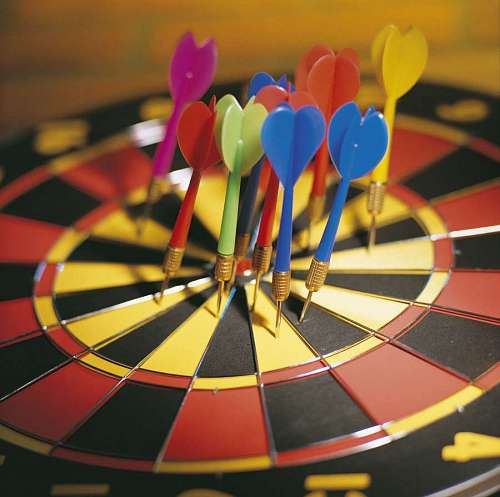 aim dart board view with multiple darts