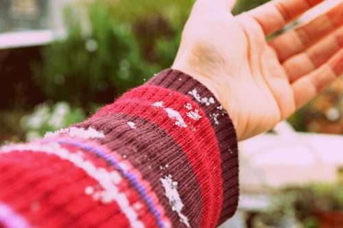 reach hand reaching gesture, woman, wool, winter, pullov
