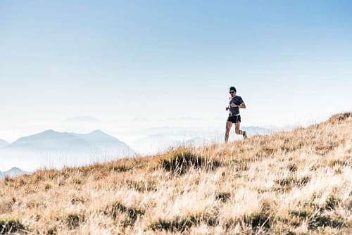  man doing running in nature