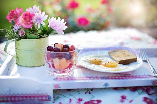 Toasts with egg and fruit salad
