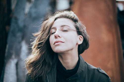 Portrait of a young woman with closed eyes