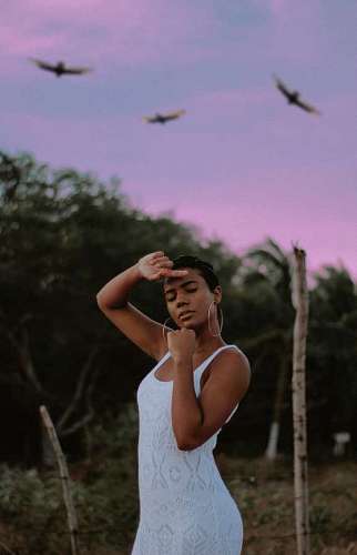 staring-at-camera Portrait of Latin Woman Staring At Camera Outdoors
