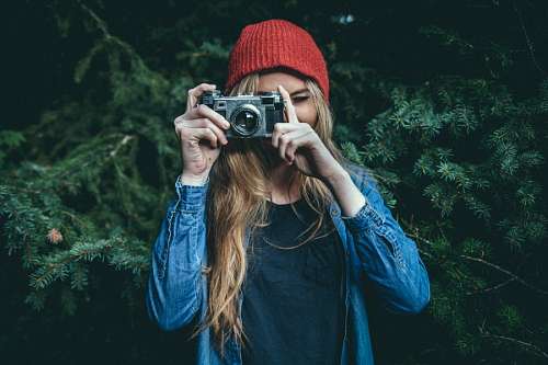 Woman taking photograph