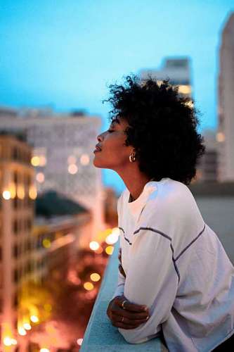 businesswoman Young woman sighing from the balcon