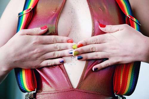 lesbian Woman With Multicolored Nail Polishes