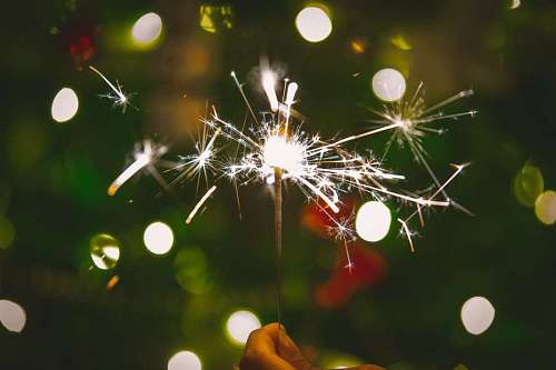 christmastime Sparkler lit with bokeh background