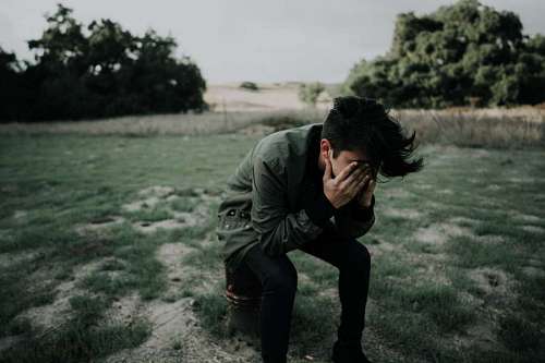 wide-angle Sad young man