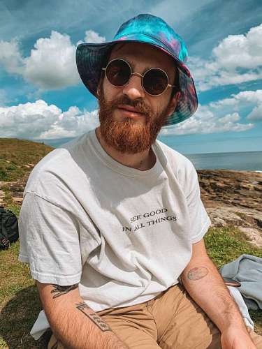  Young man in sunglasses looking at camera