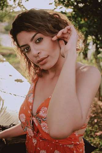 staring-at-camera Portrait of Latin Woman Staring At Camera Outdoors