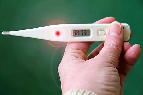 close-up of a thermometer with a high temperature