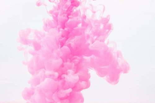 Pink smoke on white background