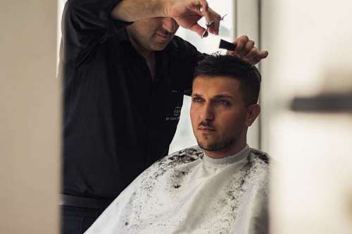 haircut barber cutting a client's hair