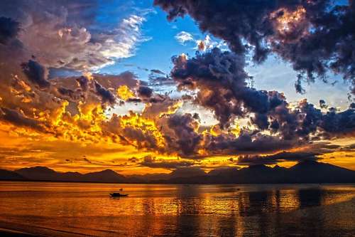 Landscape with dramatic sky at sunset on the coast