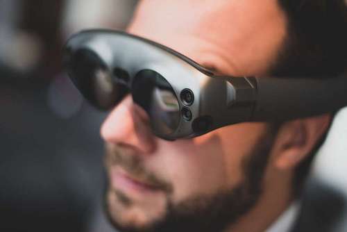 Businessman using virtual reality glasses
