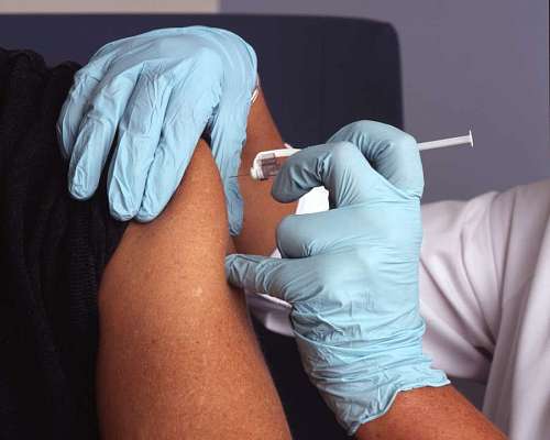 hospital Doctor applying a vaccine