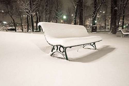 covers Bench in snowy park