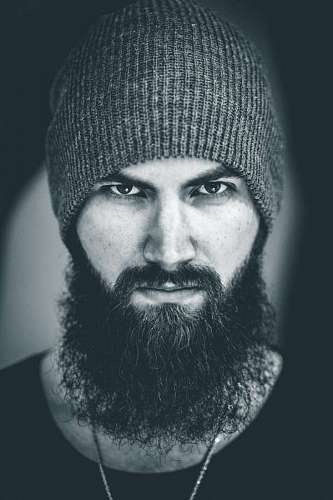 Portrait of a hipster man looking at the camera seriously