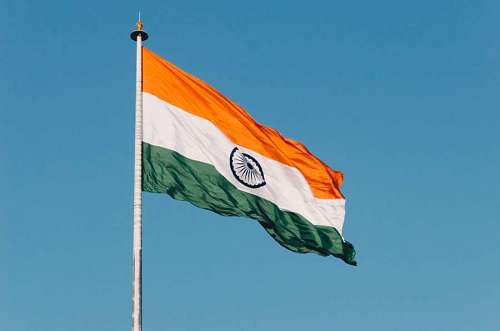 Flag of India against blue sky