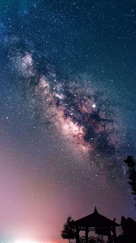Night landscape with the milky way in the background