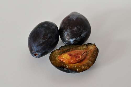 plums, prunes, fruit, fruits, three, half cut, car
