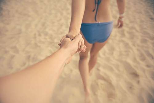 feelings Holding hands in the sand