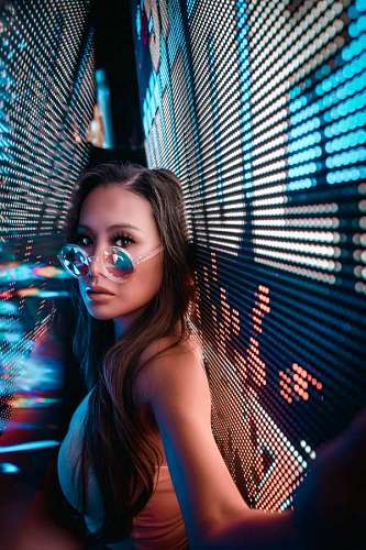 Young woman with glasses and modern look looking at the camera