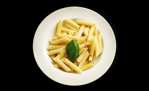 curly Corkscrew noodles on black background