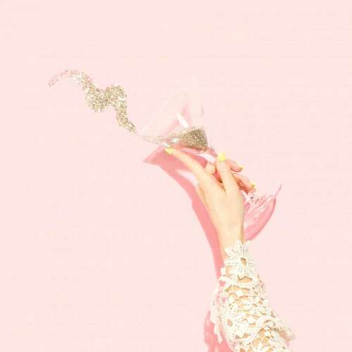 martini-glass person holding clear martini glass