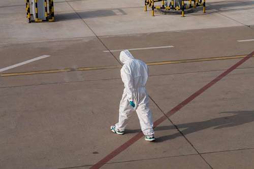 uniform Man wearing protective suit (hazmat suit)