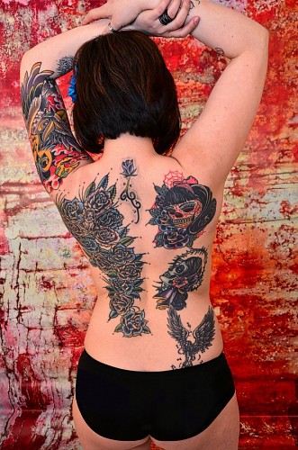 lingerie Young woman tattooed on her back