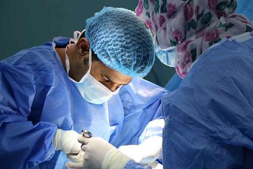 surgeons operating in the operating room