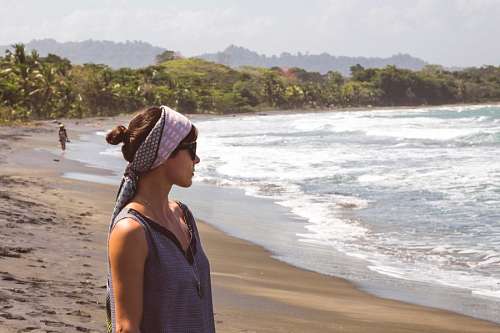 Woman at beach watching the skyline