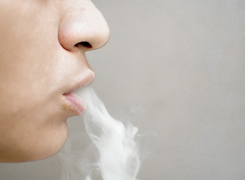 cigarette Woman vaping with electronic cigarette