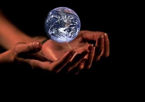 awareness Woman hands holding the world