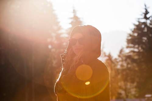 Woman at forest sunset