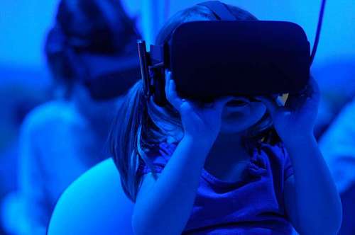 augmented-reality Little girl wearing vr mask